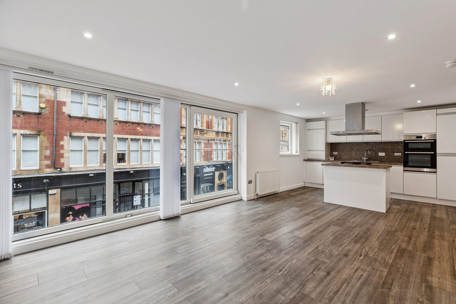26-foot open-plan living, dining and kitchen with full-height windows in Glasgow city centre